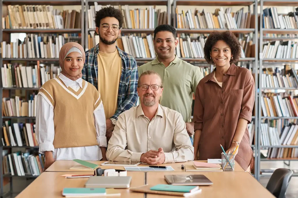 Students at an adult literacy course in a library.